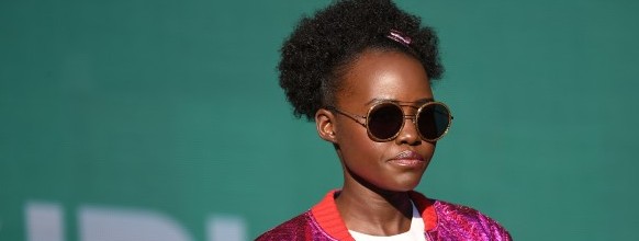 (FILES) This file photo taken on September 23, 2017 shows Lupita Nyong'o speaking onstage during the 2017 Global Citizen Festival in Central Park to End Extreme Poverty by 2030 at Central Park in New York City. Kenyan actress Lupita Nyong'o, who won an Oscar for her role in "12 Years a Slave", on November 10, 2017, complained her hair had been airbrushed out of a picture on the front cover of women's magazine Grazia UK. / AFP / ANGELA WEISS

 FILES-BRITAIN-FILM-RASCISM