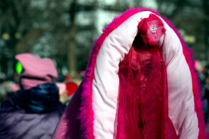 A demonstrator dressed as a vagina marches during the Denver's Women'